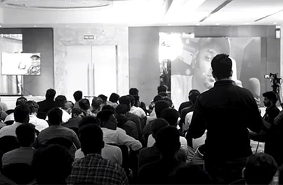 Attendee asking a question during an audience Q&A
